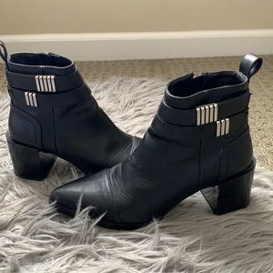 Pointy black boots
